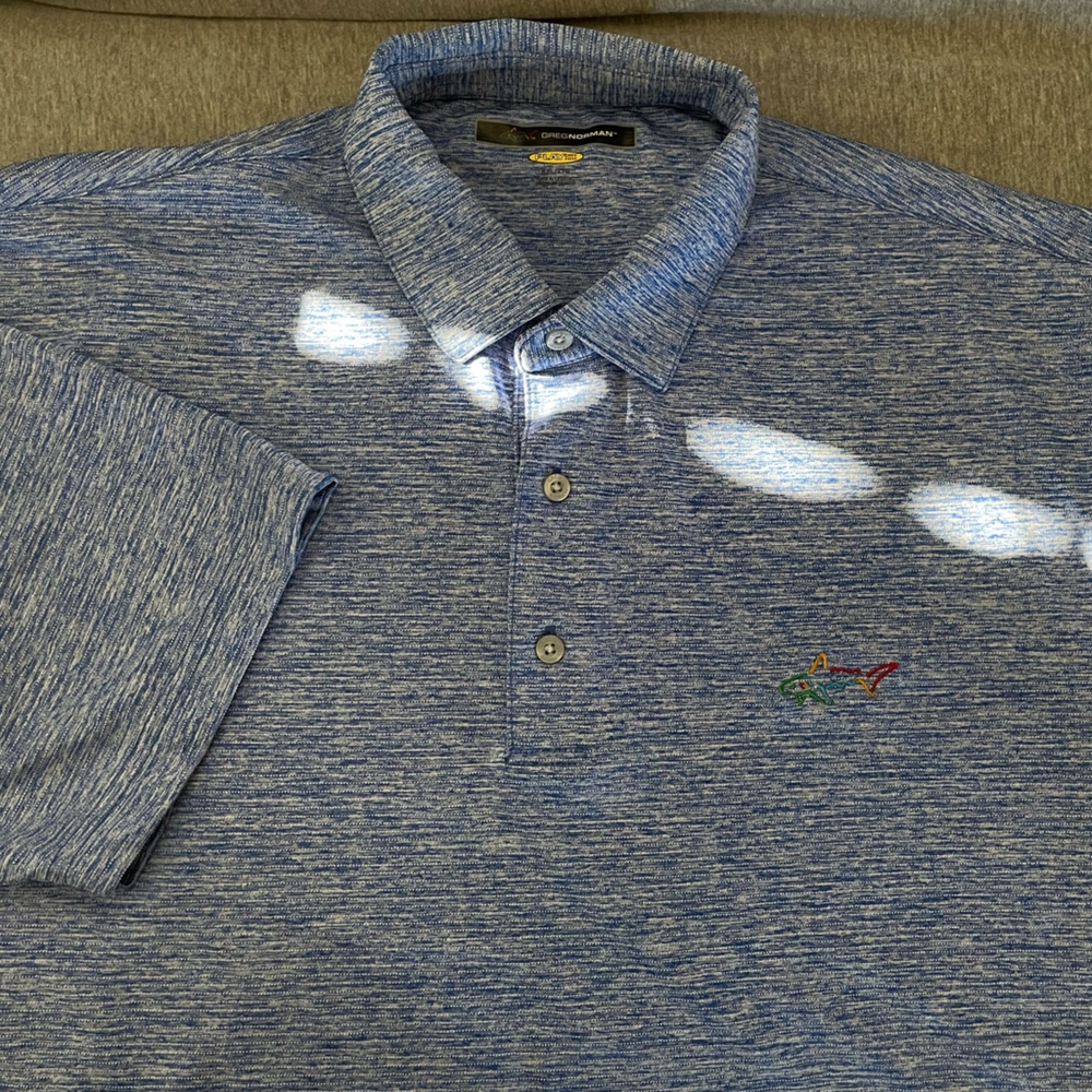 Greg Norman Play-Dry golf polo in heathered blue and white. Size XXL